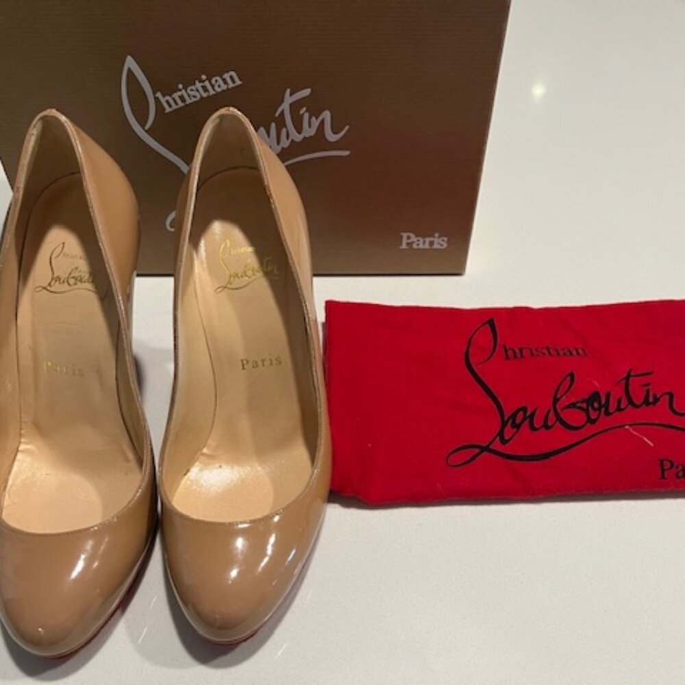 Gorgeous platform Louboutins purchased at the flagship store in Paris